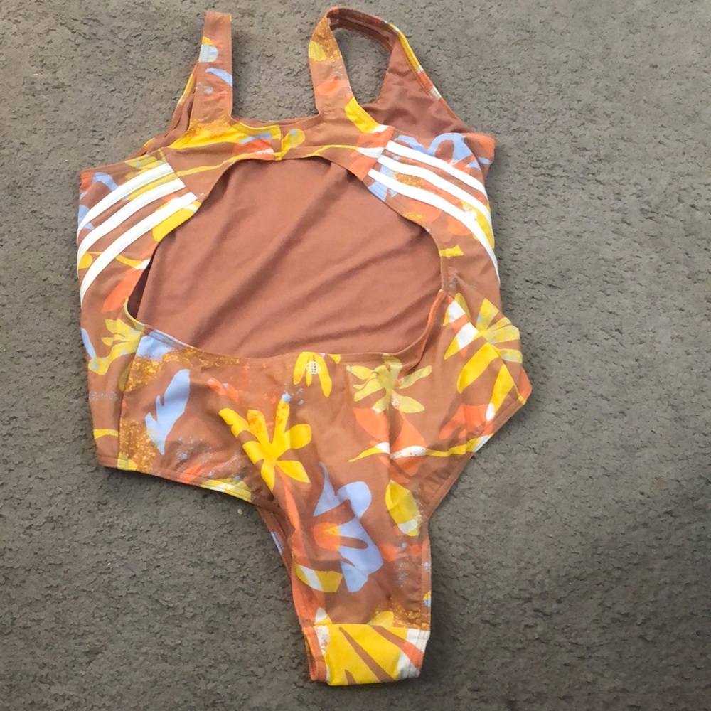Adidas floral bathing suit. Two available sizes 8and 16.